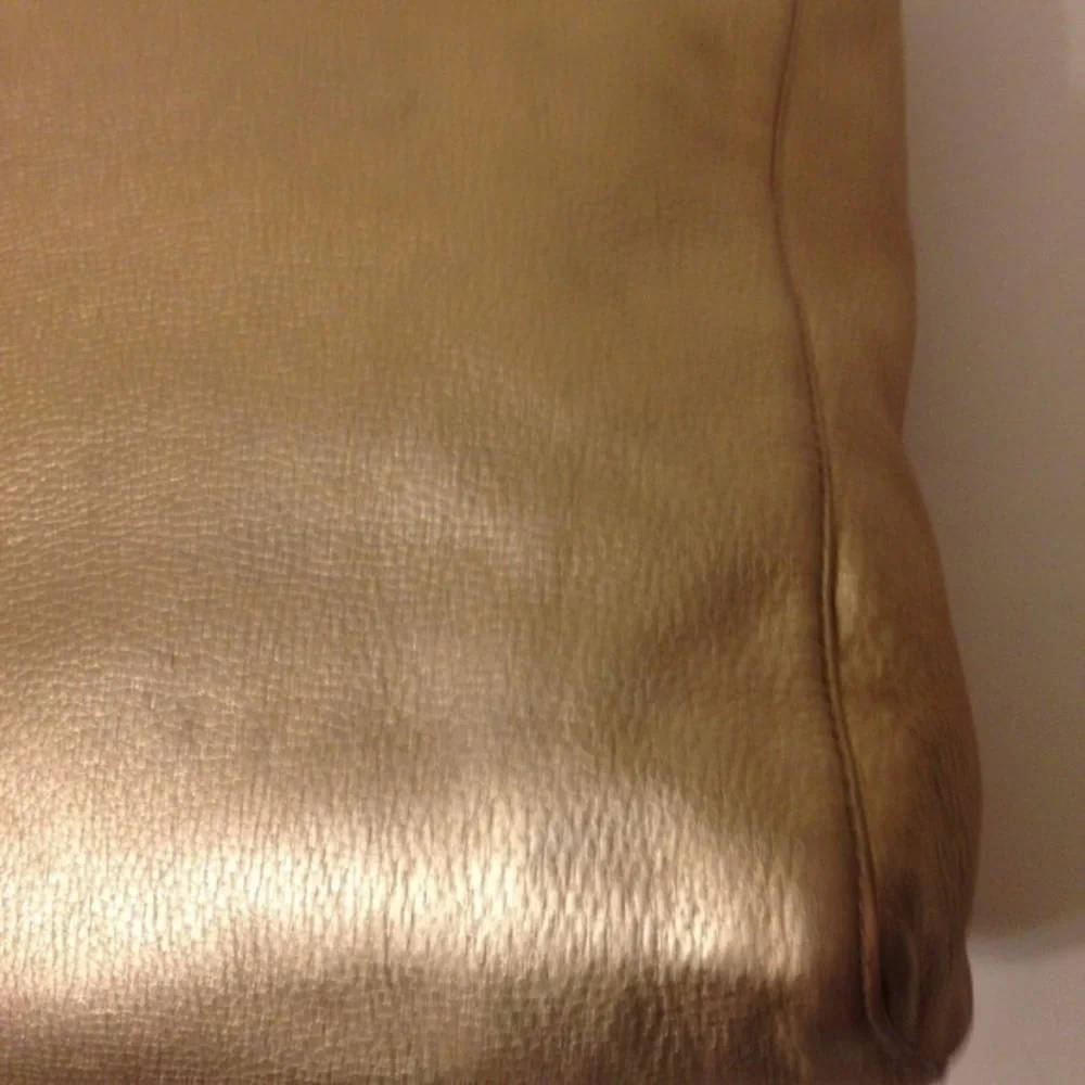 Michael Kors gold metallic leather bag